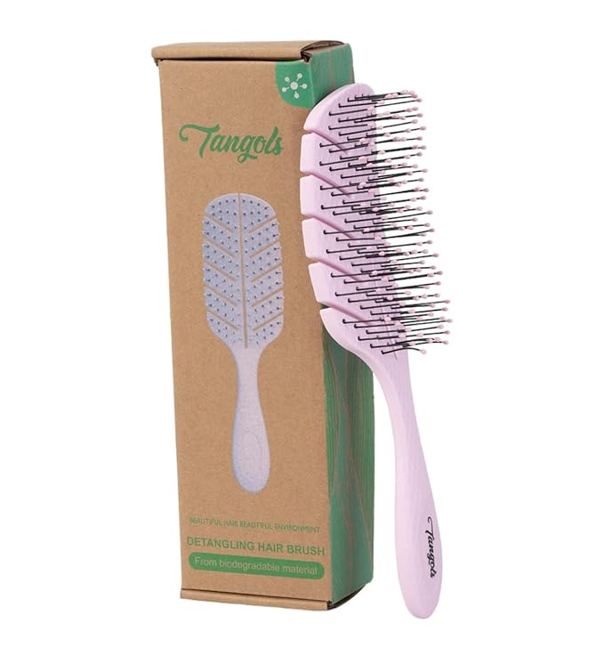 Packaging for Tangols pink detangling hairbrush