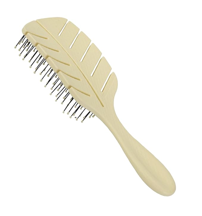 Beige minimalist hairbrush with streamlined design