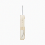 Front view of cream-colored Epsilon water flosser