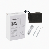 Cream-colored Epsilon water flosser set with packaging and accessories